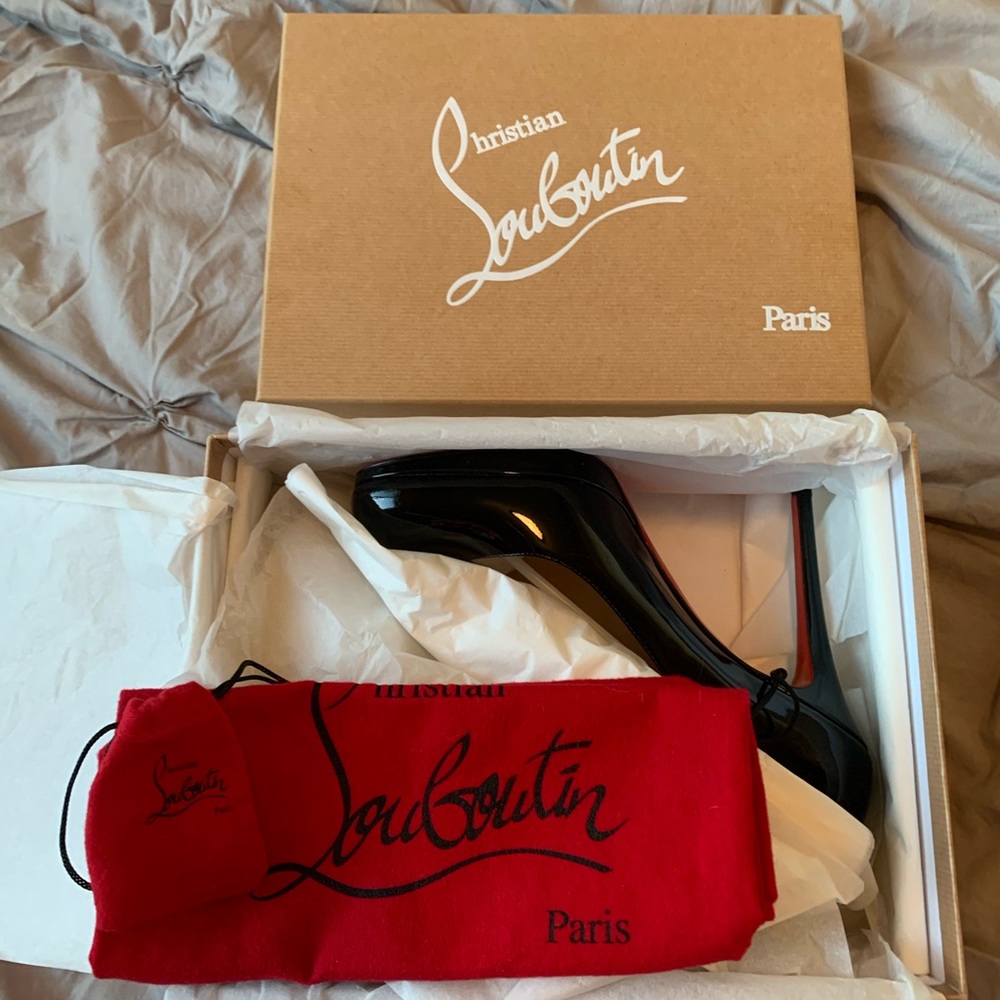 Louboutin black patent pumps